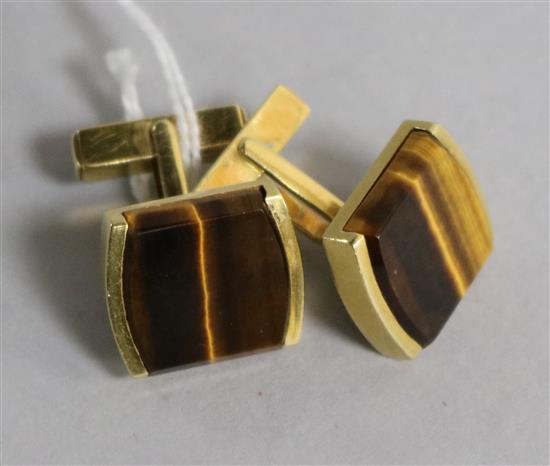 A pair of 18ct gold and tigers eye quartz cufflinks.
